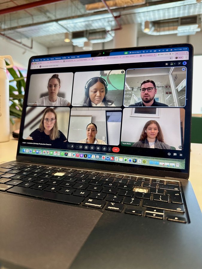 The team on a production check-in call